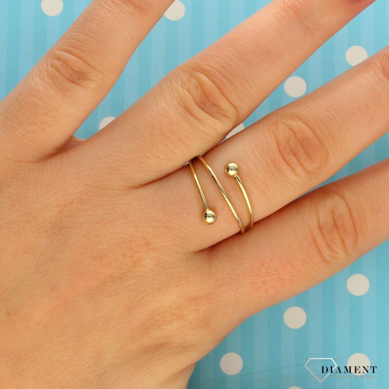 Złoty pierścionek 585 szeroki z kulkami.jpg